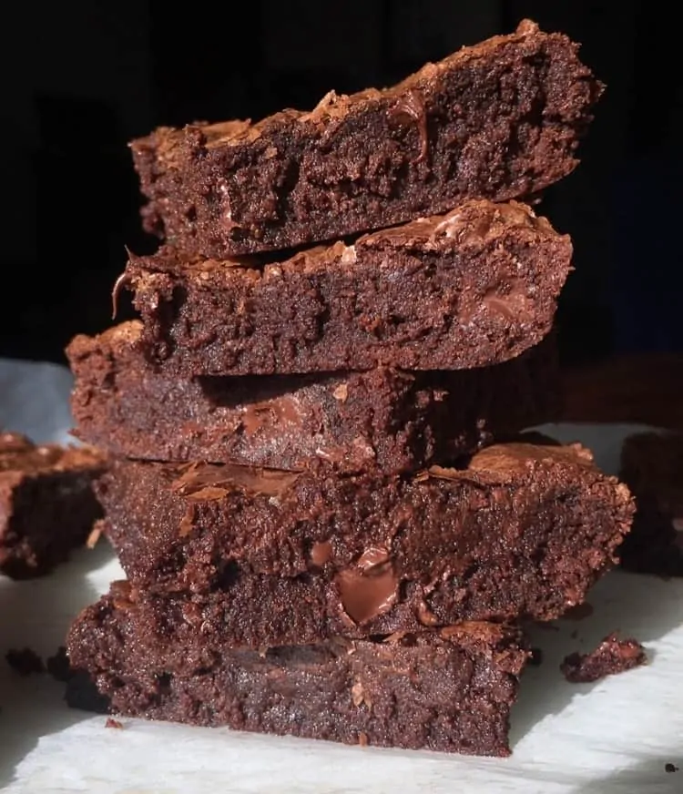 brownies cut into squares stacked in a tower