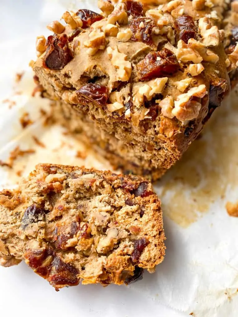 close up of tahini date loaf showcasing the date pieces inside