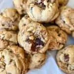 chewy and soft date walnut cookies with bits of dates and walnuts speckled throughout