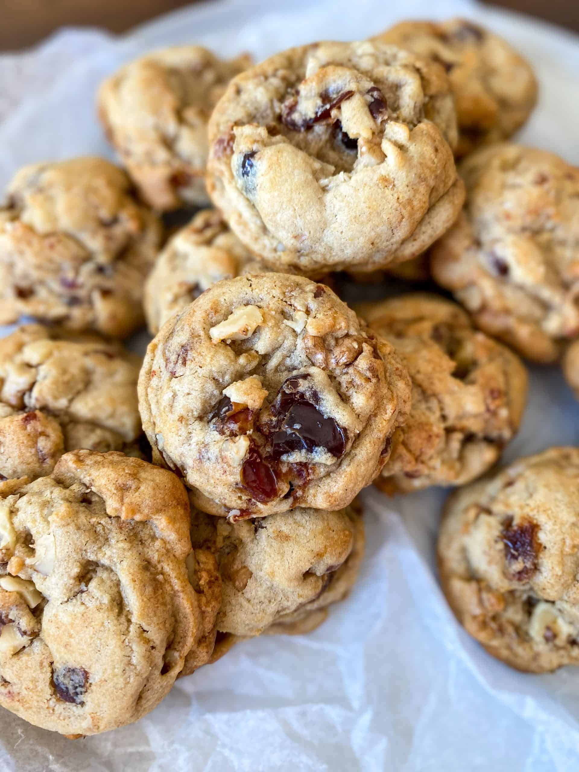 chewy and soft date walnut cookies with bits of dates and walnuts speckled throughout