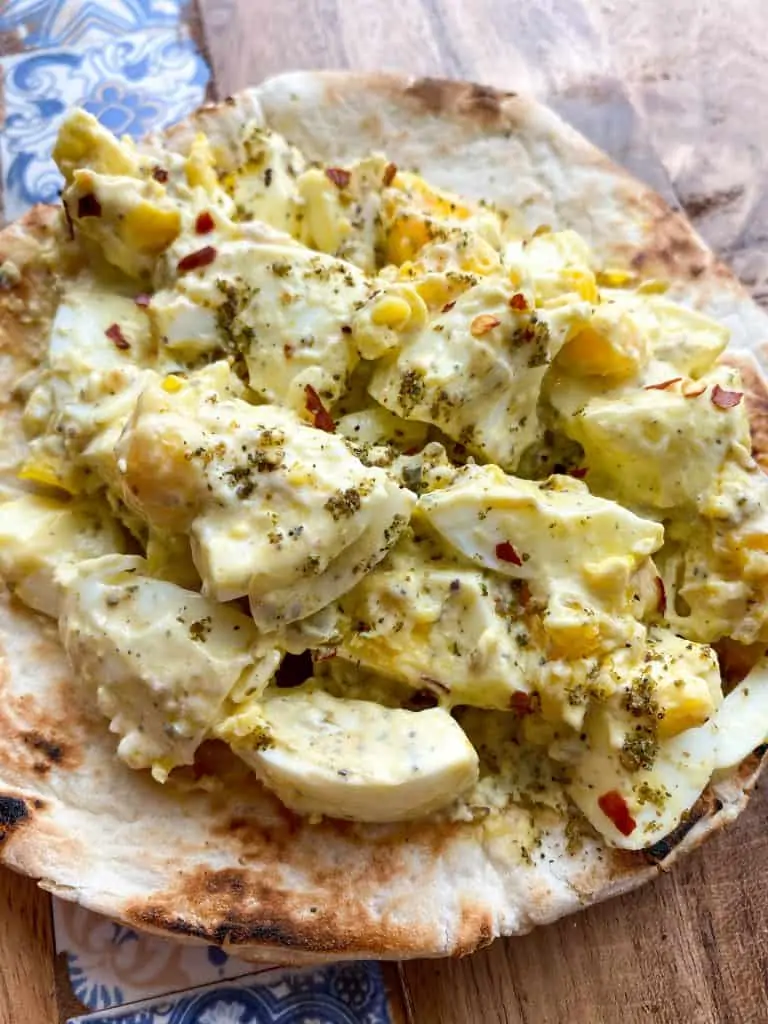 healthy egg salad close up on a pita bread
