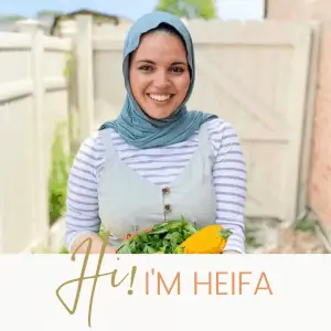 Heifa holding a basket of garden vegetables with text that reads HiI'm Heifa