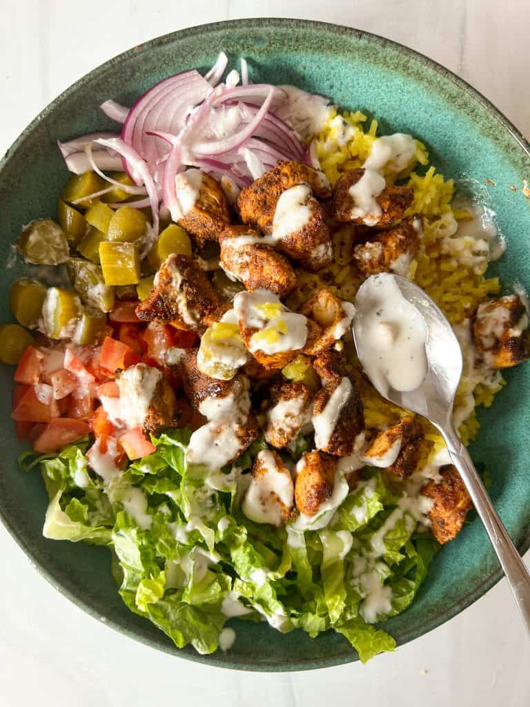 chicken shawarma bowl with toppings