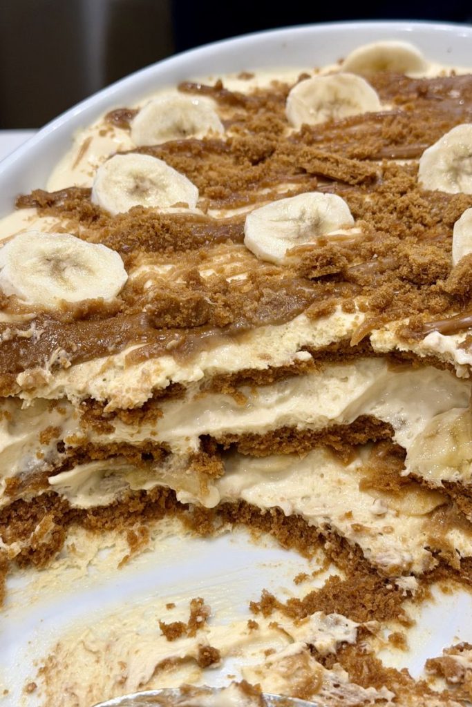 Sliced Biscoff banana pudding showing creamy layered texture